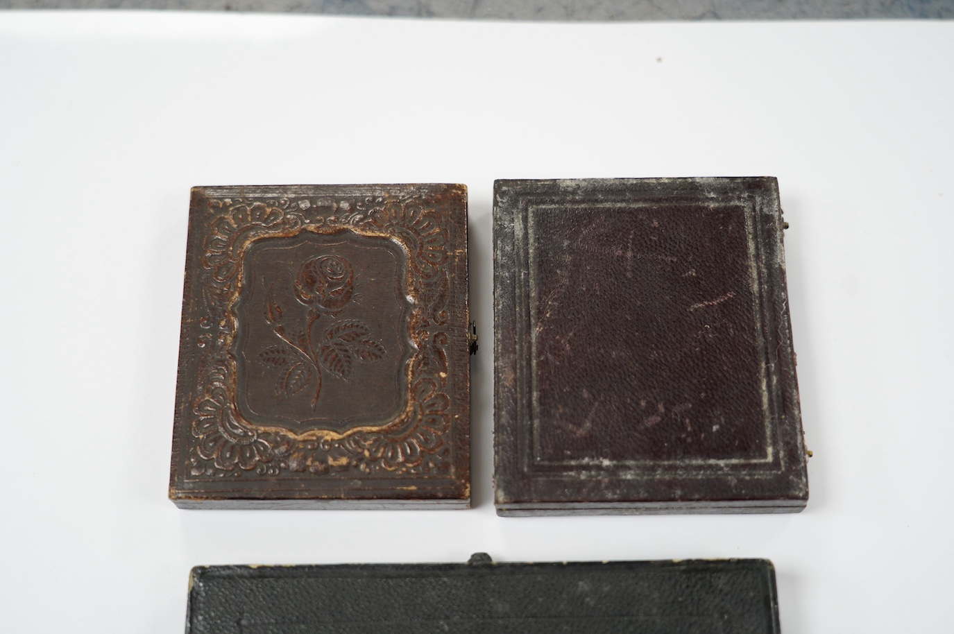 Two daguerrotype photographs